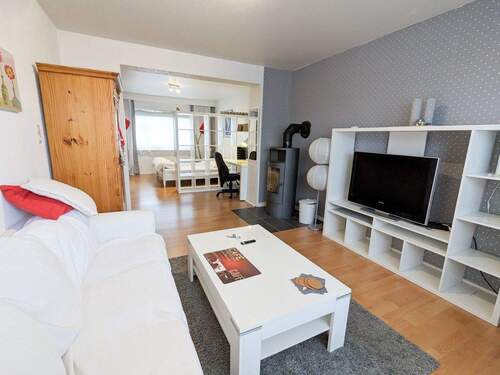 Wohnzimmer mit Kaminofen - 