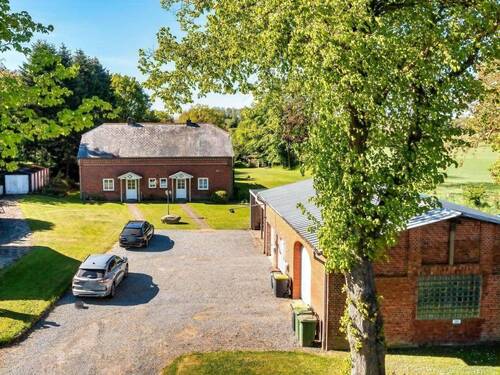 Vorderansicht aus der Luft - 6 Zimmer Mehrfamilienhaus, Wohnhaus zum Kaufen in Sörup
