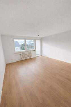 Wohnzimmer - Etagenwohnung mit 70,00 m&sup2; in Asterstein zum Kaufen