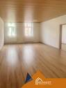Wohnzimmer - 3 Zimmer Wohnung in zentrumsnähe von Oelsnitz Besichtigung am 5.6.2025