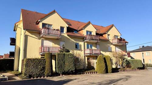 Hausansicht b - Attraktives Wohnungspaket als Investment