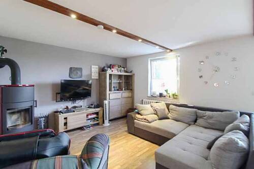 Wohnzimmer mit Kamin - 7 Zimmer Einfamilienhaus in Gustow