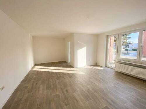 Wohnzimmer weitere Ansicht 2 - AB SOFORT: MIETFREIE ZEIT IN BRUNSBÜTTEL Renovierte 2-Zimmer-Wohnung + Balkon OTTO STÖBEN GmbH