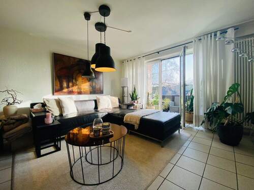 Wohnbereich - Zugang zum Balkon - Etagenwohnung mit 78,00 m&sup2; in Bottrop zum Kaufen