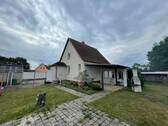 Rückansicht EFH mit überdachter Terrasse - 4 Zimmer Einfamilienhaus zum Kaufen in Möckern