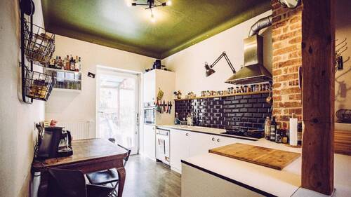 Küche mit Türe in den Garten - 4 Zimmer Etagenwohnung zum Kaufen in Heilbronn