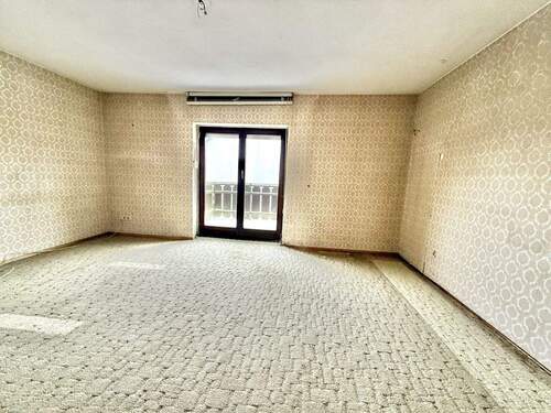 Schlafzimmer mit Balkonzugang - 