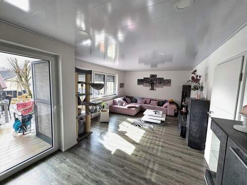 Wohnzimmer EG - 6 Zimmer Einfamilienhaus zum Kaufen in Meßstetten