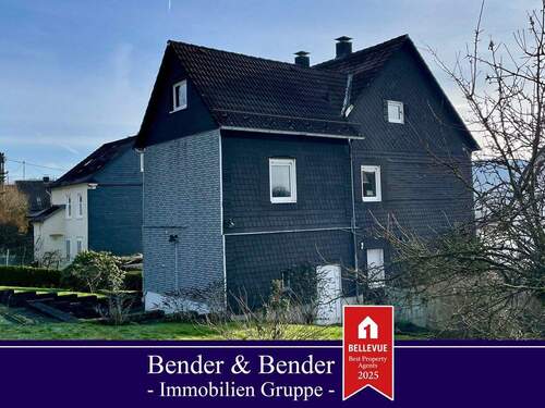 Bild 1 - Geräumiges 1-2 Familienhaus mit Garten und zwei Garagen!