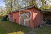 Nebengebäude mit Carport - 