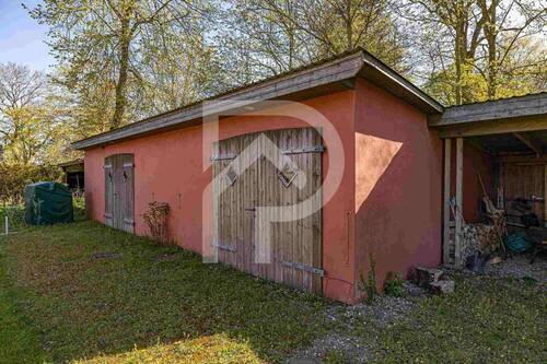Nebengebäude mit Carport - 