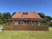 Außenansicht Südseite mit Solarthermieanlage und Terrasse - Einfamilienhaus mit 149,60 m&sup2; in Oetzen zum Kaufen