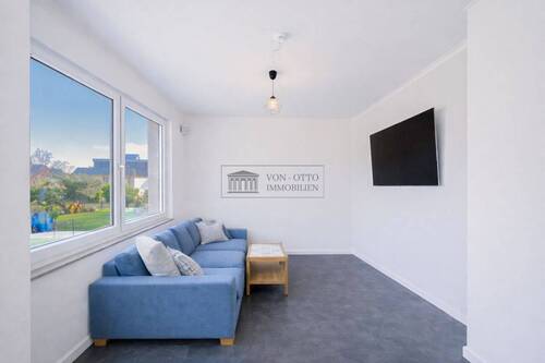 Wohnzimmer - Mehrfamilienhaus, Wohnhaus mit 121,00 m&sup2; in Ilsede zum Kaufen