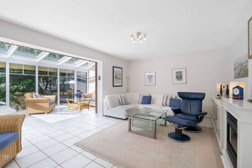 Wohnzimmer mit Wintergarten - 