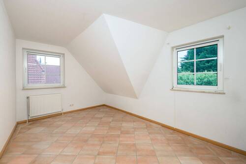 Helles Dachgeschosszimmer - 
