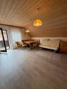 Wohnbereich mit Balkon.jpeg - 