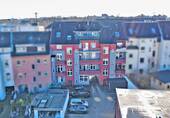 Rückansicht - Citynahes Mehrfamilienhaus mit Gewerbeeinheit im Hof