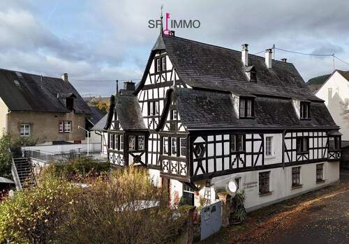 Bild 2 - 9 Zimmer Mehrfamilienhaus, Wohnhaus zum Kaufen in Kröv