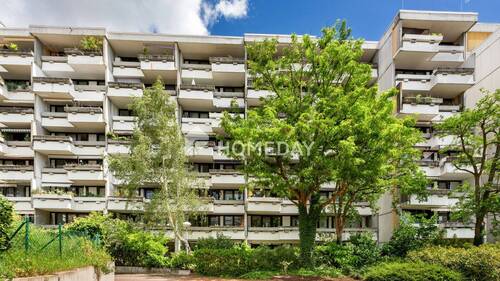 Außenansicht 2 - Kernsanierte 3-Zimmer-Wohnung mit Balkon, Garagenstellplatz und Aufzug in Mainz-Finthen