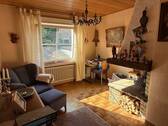 Wohnzimmer mit offenen Kamin 1.OG - 1 Zimmer Einfamilienhaus in Beverungen