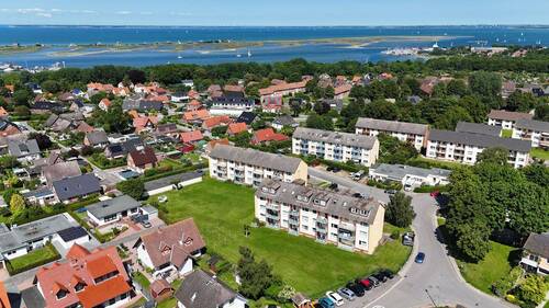Luftaufnahme - VERKAUFTHeiligenhafen, charmante 3 Zi.-65m² ,Hochparterre-Wohnung mit Balkon, EBK u. Vollbad in ruhiger Lage