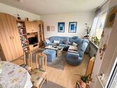 Wohnzimmer Teilansicht - Etagenwohnung mit 63,00 m² in Heiligenhafen zum Kaufen