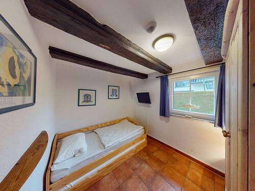 Schlafzimmer 1 im Erdgeschoss - 