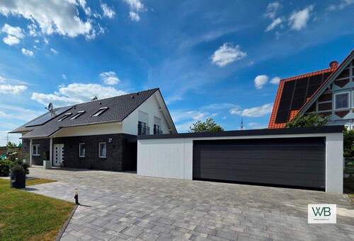 Hausansicht vorne - 6 Zimmer Einfamilienhaus zum Kaufen in Rennau / Ahmstorf