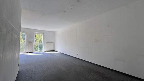 Wohn- / Esszimmer - 