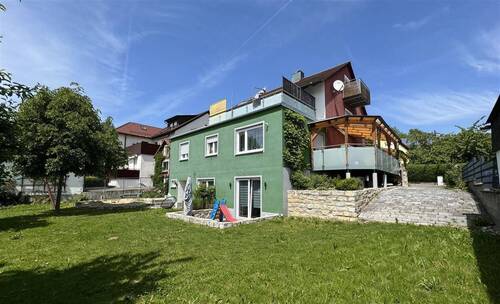 Ansicht vom Garten - Mehrfamilienhaus, Wohnhaus in Feuchtwangen zum Kaufen