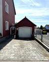 Garage und Stellplatz - 