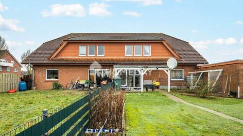 Außenansicht 1 - Attraktives Mehrfamilienhaus mit 4 WEs, Garten und Garagen in Bersenbrück