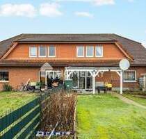 Attraktives Mehrfamilienhaus mit 4 WEs, Garten und Garagen in Bersenbrück