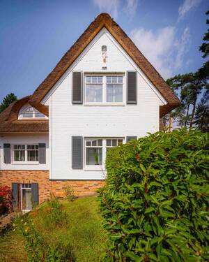 Seitenansicht - 5 Zimmer Einfamilienhaus in Buchholz in der Nordheide
