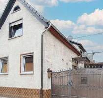 Wohnglück schaffen und erweitern in Gimbsheim: EFH mit Renovierungsbedarf und Anbau im Rohbau