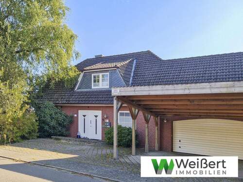 Titelbild - Ruhig, geräumig, familiengerecht - Einfamilienhaus mit 162m² Wohnfläche, Vollkeller, Doppelgarage und großem Grundstück in verkehrsberuhigter Lag