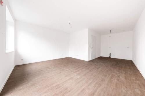 Wohnzimmer - 2 Zimmer Terrassenwohnung in Rhauderfehn