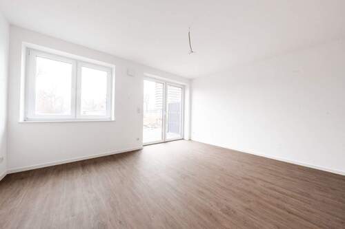 Wohnzimmer - Terrassenwohnung mit 71,20 m&sup2; in Rhauderfehn zum Kaufen