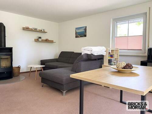 Wohnzimmer mit Kaminofen - 