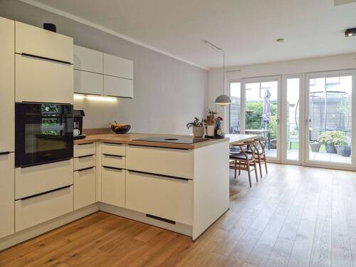 Wohn- und Essbereich mit Zugang zur Terrasse - 5 Zimmer Reihenendhaus zum Kaufen in Norderstedt