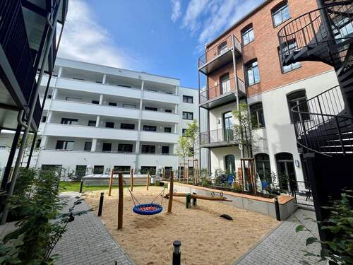 Innenhof - Großzügige, möblierte 1-Zimmer-Wohnung im Neubau!