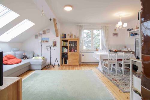 Wohnzimmer mit Kachelofen OG - 