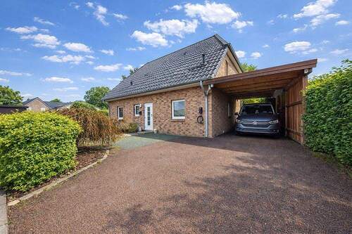 200-8896_Hausansicht-4_Sommer - 4 Zimmer Einfamilienhaus zum Kaufen in Uetersen