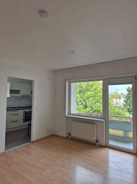 Wohnzimmer - Helle 2-Zimmer Wohnung mit Balkon und 2 Tiefgaragenstellplätze in Bobenheim-Roxheim