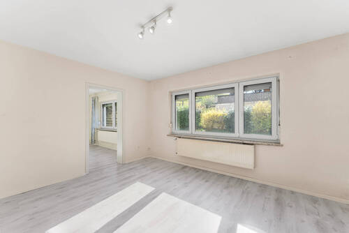 Wohnzimmer Erdgeschoss - 5 Zimmer Einfamilienhaus zum Kaufen in Lindlar