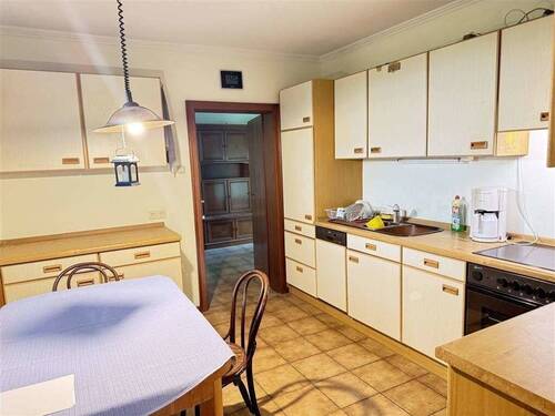 Küche mit Zugang in das - Bungalow mit 129,00 m² in Rosengarten zum Kaufen