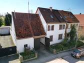 Haus von vorne - 7 Zimmer Mehrfamilienhaus, Wohnhaus zum Kaufen in Rauenberg