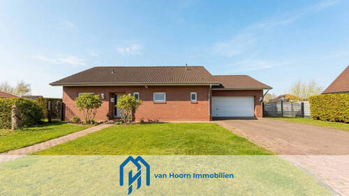 Titelbild - Gepflegter Bungalow mit großzügiger Garage und Wintergarten in Ostrhauderfehn