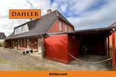 Außenansicht (Eingangsseite) mit Carport - 3 Zimmer Terrassenwohnung zum Kaufen in Wyk auf Föhr
