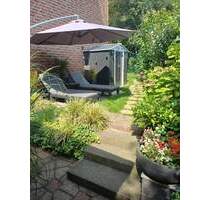 Gemütliche Souterrainwohnung mit Terrasse, Garten und zwei PKW-Stellplätzen in Rheinberg-Borth